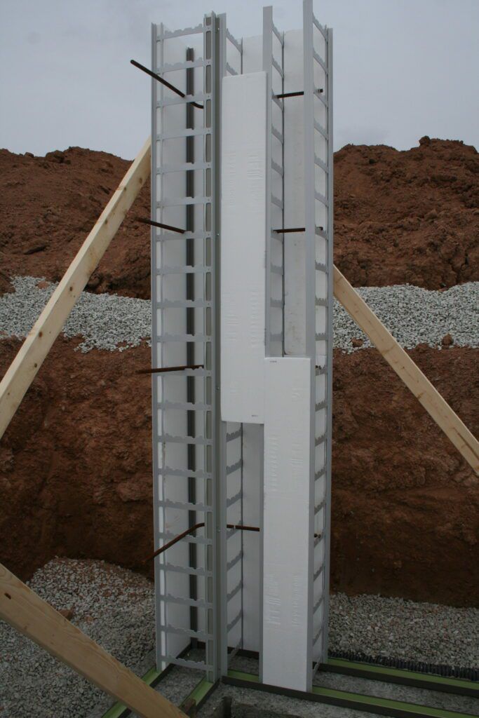 A B3X wall of vertical panels and studs growing on a real jobsite