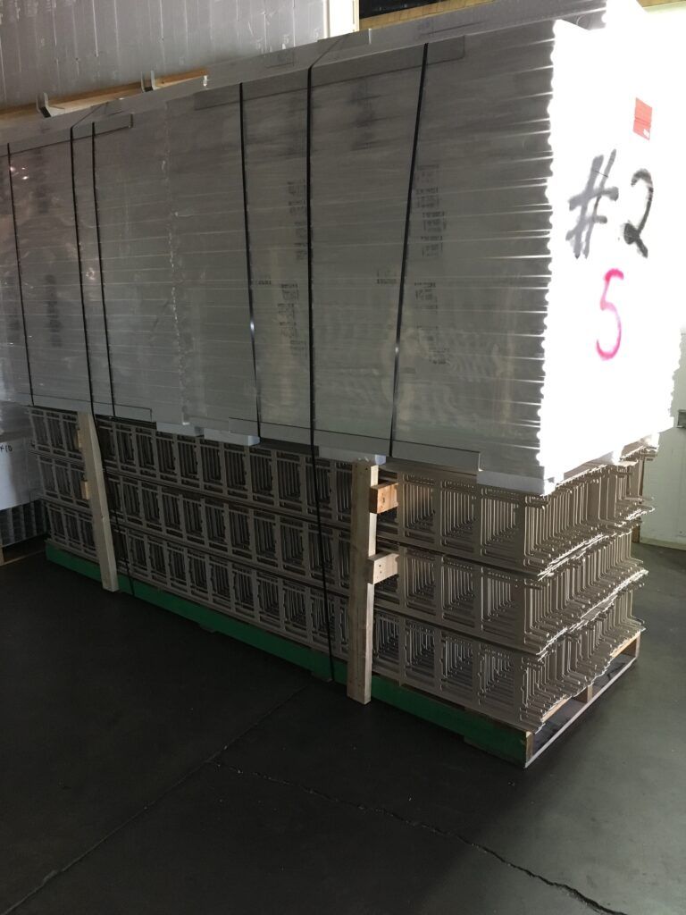 B3X panels stacked flat on a shipping pallet